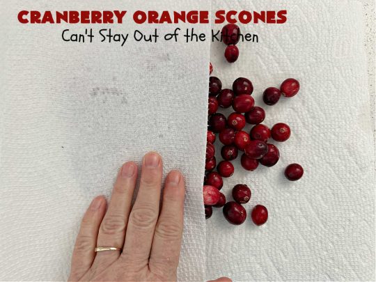 Cranberry Orange Scones | Can't Stay Out of the Kitchen | these luscious #scones have the most spectacular combination of flavors using fresh #cranberries, #OrangeZest & featuring a luscious #orange icing with more Orange Zest on top. They simply beg to be eaten! You'll be swooning after sinking your teeth into these amazing #CranberryOrangeScones. Great for a weekend, company or #holiday #breakfast or #brunch like #Thanksgiving, #Christmas, #NewYearsDay or #ValentinesDay.