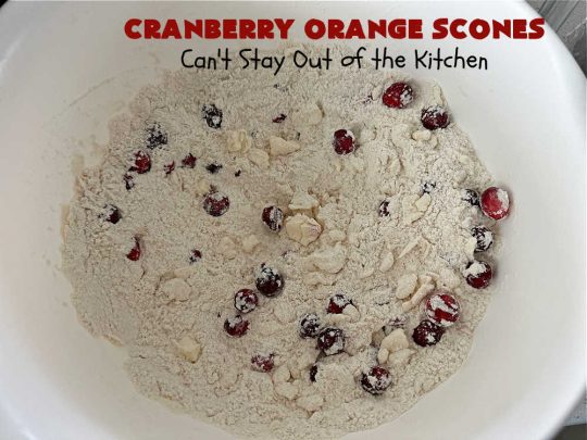 Cranberry Orange Scones | Can't Stay Out of the Kitchen | these luscious #scones have the most spectacular combination of flavors using fresh #cranberries, #OrangeZest & featuring a luscious #orange icing with more Orange Zest on top. They simply beg to be eaten! You'll be swooning after sinking your teeth into these amazing #CranberryOrangeScones. Great for a weekend, company or #holiday #breakfast or #brunch like #Thanksgiving, #Christmas, #NewYearsDay or #ValentinesDay.