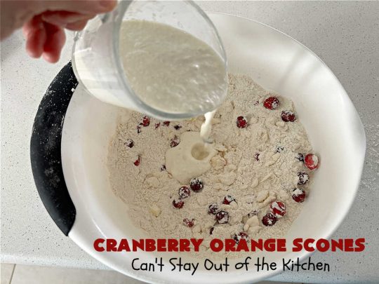 Cranberry Orange Scones | Can't Stay Out of the Kitchen | these luscious #scones have the most spectacular combination of flavors using fresh #cranberries, #OrangeZest & featuring a luscious #orange icing with more Orange Zest on top. They simply beg to be eaten! You'll be swooning after sinking your teeth into these amazing #CranberryOrangeScones. Great for a weekend, company or #holiday #breakfast or #brunch like #Thanksgiving, #Christmas, #NewYearsDay or #ValentinesDay.
