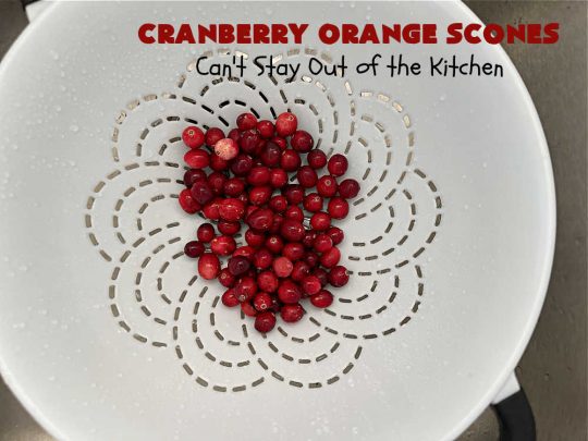 Cranberry Orange Scones | Can't Stay Out of the Kitchen | these luscious #scones have the most spectacular combination of flavors using fresh #cranberries, #OrangeZest & featuring a luscious #orange icing with more Orange Zest on top. They simply beg to be eaten! You'll be swooning after sinking your teeth into these amazing #CranberryOrangeScones. Great for a weekend, company or #holiday #breakfast or #brunch like #Thanksgiving, #Christmas, #NewYearsDay or #ValentinesDay.