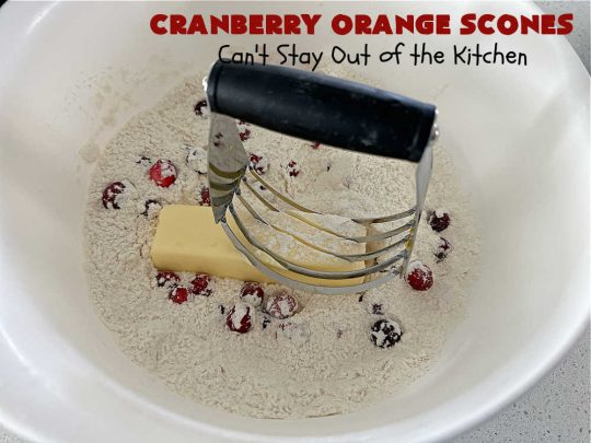 Cranberry Orange Scones | Can't Stay Out of the Kitchen | these luscious #scones have the most spectacular combination of flavors using fresh #cranberries, #OrangeZest & featuring a luscious #orange icing with more Orange Zest on top. They simply beg to be eaten! You'll be swooning after sinking your teeth into these amazing #CranberryOrangeScones. Great for a weekend, company or #holiday #breakfast or #brunch like #Thanksgiving, #Christmas, #NewYearsDay or #ValentinesDay.