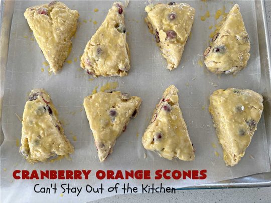 Cranberry Orange Scones | Can't Stay Out of the Kitchen | these luscious #scones have the most spectacular combination of flavors using fresh #cranberries, #OrangeZest & featuring a luscious #orange icing with more Orange Zest on top. They simply beg to be eaten! You'll be swooning after sinking your teeth into these amazing #CranberryOrangeScones. Great for a weekend, company or #holiday #breakfast or #brunch like #Thanksgiving, #Christmas, #NewYearsDay or #ValentinesDay.