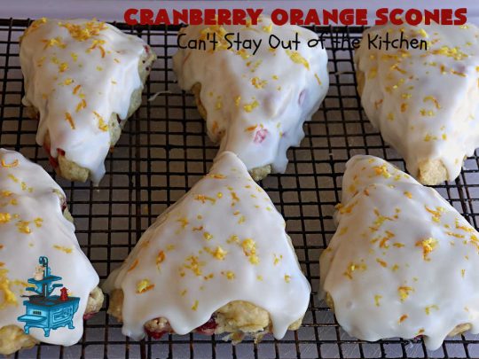 Cranberry Orange Scones | Can't Stay Out of the Kitchen | these luscious #scones have the most spectacular combination of flavors using fresh #cranberries, #OrangeZest & featuring a luscious #orange icing with more Orange Zest on top. They simply beg to be eaten! You'll be swooning after sinking your teeth into these amazing #CranberryOrangeScones. Great for a weekend, company or #holiday #breakfast or #brunch like #Thanksgiving, #Christmas, #NewYearsDay or #ValentinesDay.