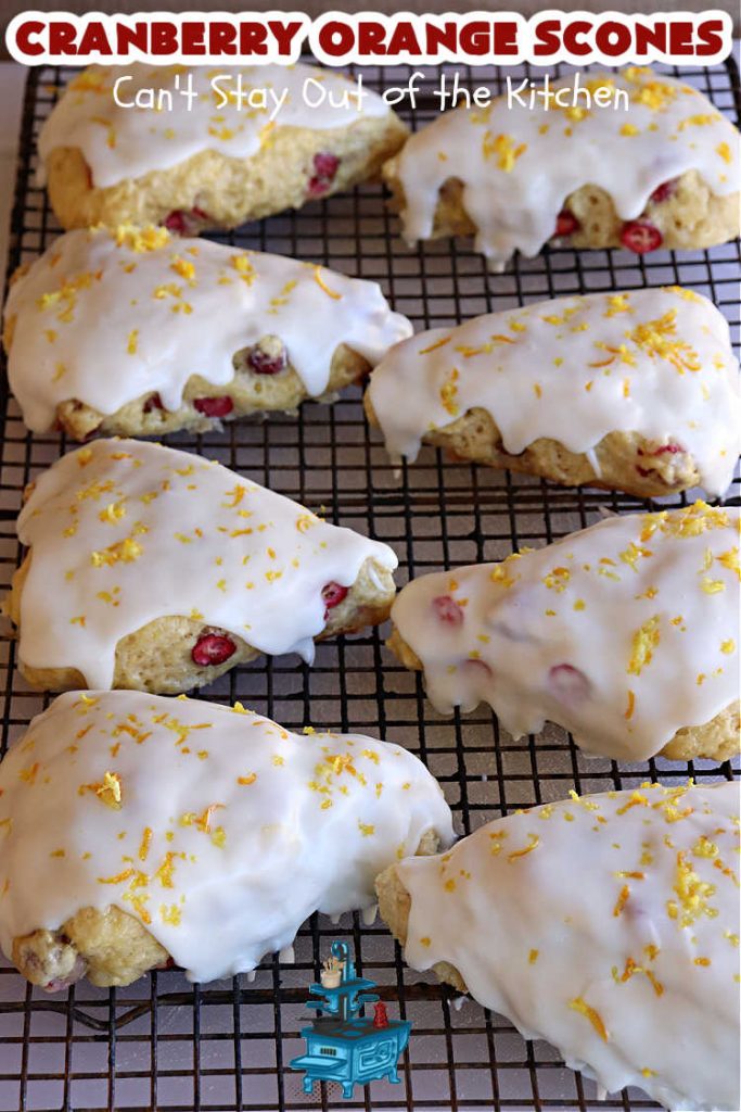 Cranberry Orange Scones | Can't Stay Out of the Kitchen | these luscious #scones have the most spectacular combination of flavors using fresh #cranberries, #OrangeZest & featuring a luscious #orange icing with more Orange Zest on top. They simply beg to be eaten! You'll be swooning after sinking your teeth into these amazing #CranberryOrangeScones. Great for a weekend, company or #holiday #breakfast or #brunch like #Thanksgiving, #Christmas, #NewYearsDay or #ValentinesDay.