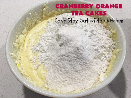Cranberry Orange Tea Cakes | Can't Stay Out of the Kitchen | These delightful #TeaCakes include fresh #cranberries, grated #OrangeZest & #walnuts. The icing also includes #orange zest. This is the perfect #dessert to bring to #holiday & #Christmas parties. Everyone will swoon over these delicious treats. #HolidayDessert #CranberryDessert #CranberryOrangeTeaCakes