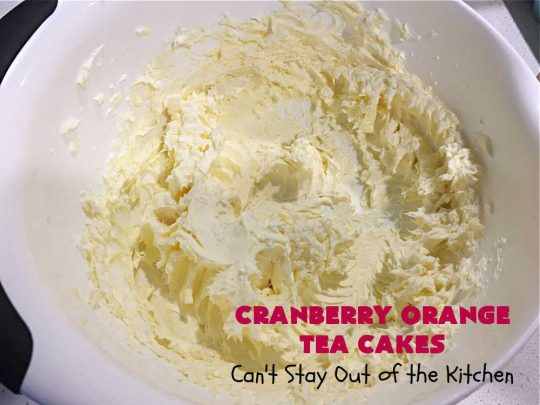 Cranberry Orange Tea Cakes | Can't Stay Out of the Kitchen | These delightful #TeaCakes include fresh #cranberries, grated #OrangeZest & #walnuts. The icing also includes #orange zest. This is the perfect #dessert to bring to #holiday & #Christmas parties. Everyone will swoon over these delicious treats. #HolidayDessert #CranberryDessert #CranberryOrangeTeaCakes