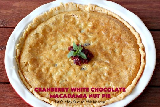 Cranberry White Chocolate Macadamia Nut Pie | Can't Stay Out of the Kitchen | this irresistible #pie is made with dried #cranberries, #MacadamiaNuts & #WhiteChocolateChips. It's so rich & decadent you'll be hooked from your first bite. Wonderful for #holiday parties and #Christmas dinner menus. #chocolate #dessert #Craisins #HolidayDessert #ChocolateDessert #CranberryDessert #CranberryWhiteChocolateMacadamiaNutPie
