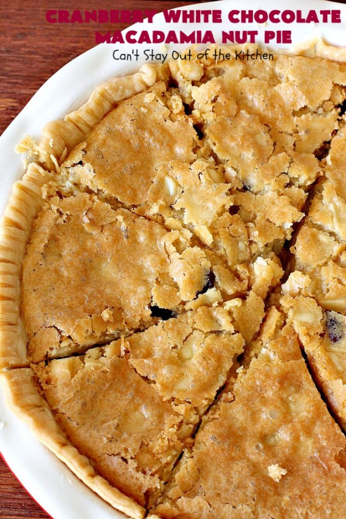 Cranberry White Chocolate Macadamia Nut Pie | Can't Stay Out of the Kitchen | this irresistible #pie is made with dried #cranberries, #MacadamiaNuts & #WhiteChocolateChips. It's so rich & decadent you'll be hooked from your first bite. Wonderful for #holiday parties and #Christmas dinner menus. #chocolate #dessert #Craisins #HolidayDessert #ChocolateDessert #CranberryDessert #CranberryWhiteChocolateMacadamiaNutPie