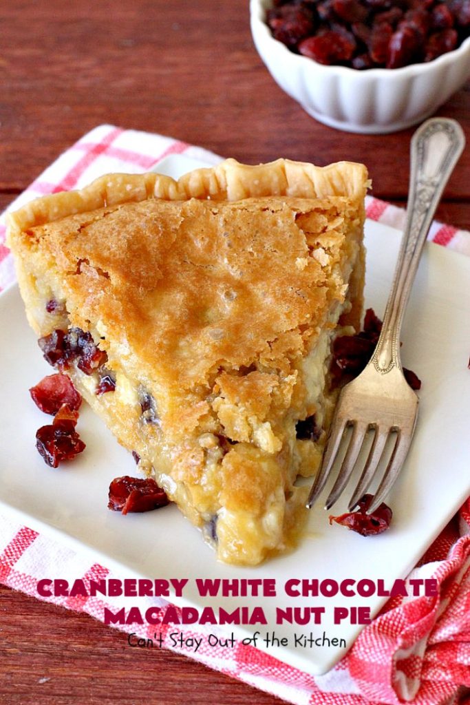 Cranberry White Chocolate Macadamia Nut Pie | Can't Stay Out of the Kitchen | this irresistible #pie is made with dried #cranberries, #MacadamiaNuts & #WhiteChocolateChips. It's so rich & decadent you'll be hooked from your first bite. Wonderful for #holiday parties and #Christmas dinner menus. #chocolate #dessert #Craisins #HolidayDessert #ChocolateDessert #CranberryDessert #CranberryWhiteChocolateMacadamiaNutPie