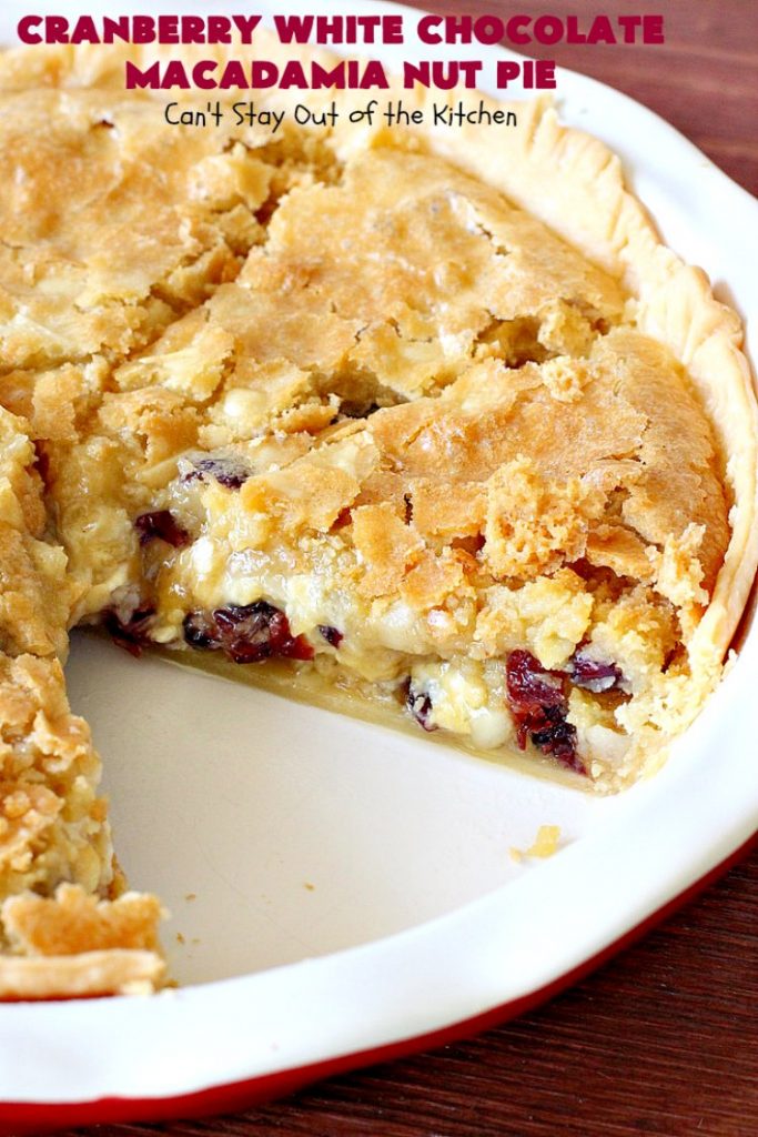 Cranberry White Chocolate Macadamia Nut Pie | Can't Stay Out of the Kitchen | this irresistible #pie is made with dried #cranberries, #MacadamiaNuts & #WhiteChocolateChips. It's so rich & decadent you'll be hooked from your first bite. Wonderful for #holiday parties and #Christmas dinner menus. #chocolate #dessert #Craisins #HolidayDessert #ChocolateDessert #CranberryDessert #CranberryWhiteChocolateMacadamiaNutPie