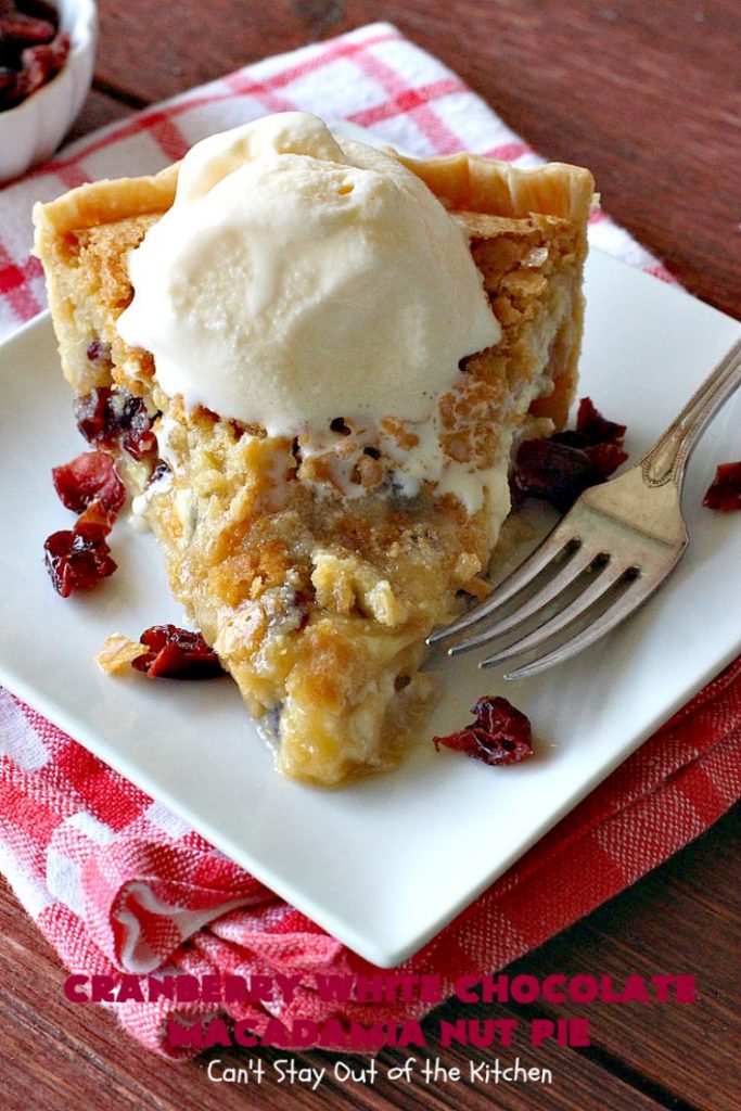 Cranberry White Chocolate Macadamia Nut Pie | Can't Stay Out of the Kitchen | this irresistible #pie is made with dried #cranberries, #MacadamiaNuts & #WhiteChocolateChips. It's so rich & decadent you'll be hooked from your first bite. Wonderful for #holiday parties and #Christmas dinner menus. #chocolate #dessert #Craisins #HolidayDessert #ChocolateDessert #CranberryDessert #CranberryWhiteChocolateMacadamiaNutPie
