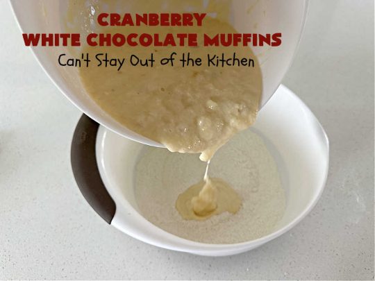 Cranberry White Chocolate Muffins | Can't Stay Out of the Kitchen | These fantastic #muffins are just what the doctor orders for a sweet tooth craving! They're filled with real #WhiteChocolateChips & #DriedCranberries. #Applesauce & #bananas also add sweetness. Excellent option for any #breakfast or #brunch menu, or for #tailgating parties or #potlucks. #cranberries #chocolate #CranberryWhiteChocolateMuffins