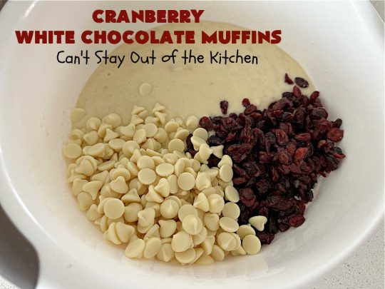 Cranberry White Chocolate Muffins | Can't Stay Out of the Kitchen | These fantastic #muffins are just what the doctor orders for a sweet tooth craving! They're filled with real #WhiteChocolateChips & #DriedCranberries. #Applesauce & #bananas also add sweetness. Excellent option for any #breakfast or #brunch menu, or for #tailgating parties or #potlucks. #cranberries #chocolate #CranberryWhiteChocolateMuffins