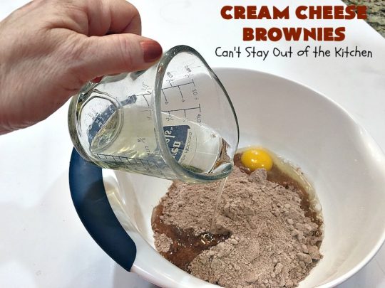Cream Cheese Brownies | Can't Stay Out of the Kitchen | This is our favorite #brownie #recipe ever! The #CreamCheese layer includes #coconut & the brownie layer includes #ChocolateChips & #pecans. Swirled together these are absolutely decadent! Terrific for #tailgating parties or summer #holiday fun like #FourthOfJuly or #LaborDay. #dessert #HolidayDessert #ChocolateDessert #CreamCheeseDessert #cookie #CreamCheeseBrownies