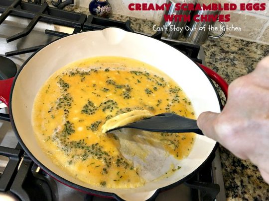 Creamy Scrambled Eggs with Chives | Can't Stay Out of the Kitchen | this outstanding #GooseberryPatch #recipe is marvelous for a weekend, company or #holiday #breakfast. #ScrambledEggs are filled with #CreamCheese & chives. Then served over toast. These creamy #eggs are easy to prepare & so delicious. #brunch #HolidayBreakfast #CreamyScrambledEggsWithChives