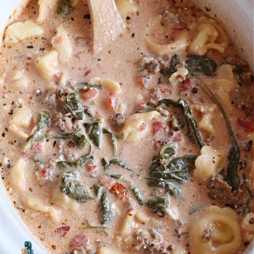 Creamy Spinach Tortellini Soup | Can't Stay Out of the Kitchen | this fantastic #soup uses only about a handful of ingredients but it cooks up into one of the most delicious #ComfortFood #recipes ever! This mouthwatering soup is so easy since it's made in the #SlowCooker! Great for cool nights or lunches. #spinach #tortellini #tomatoes #CreamCheese #ItalianSausage #pork #CreamySpinachTortelliniSoup