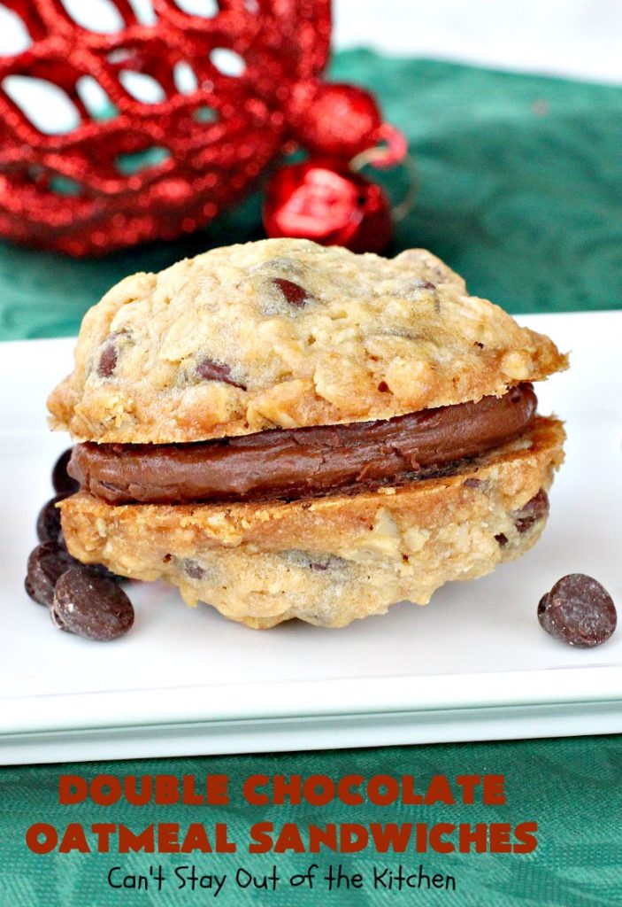 Double Chocolate Oatmeal Cookies | Can't Stay Out of the Kitchen | these spectacular #OatmealCookies feature #ChocolateChips in the #cookies and a #chocolate #fudge frosting sandwiched between to die for! Amazing #dessert for #holiday #ChristmasCookie baking. #ChristmasCookieExchange #FallBaking #DoubleChocolateOatmealSandwiches #ChocolateFudgeFrosting #HolidayDessert