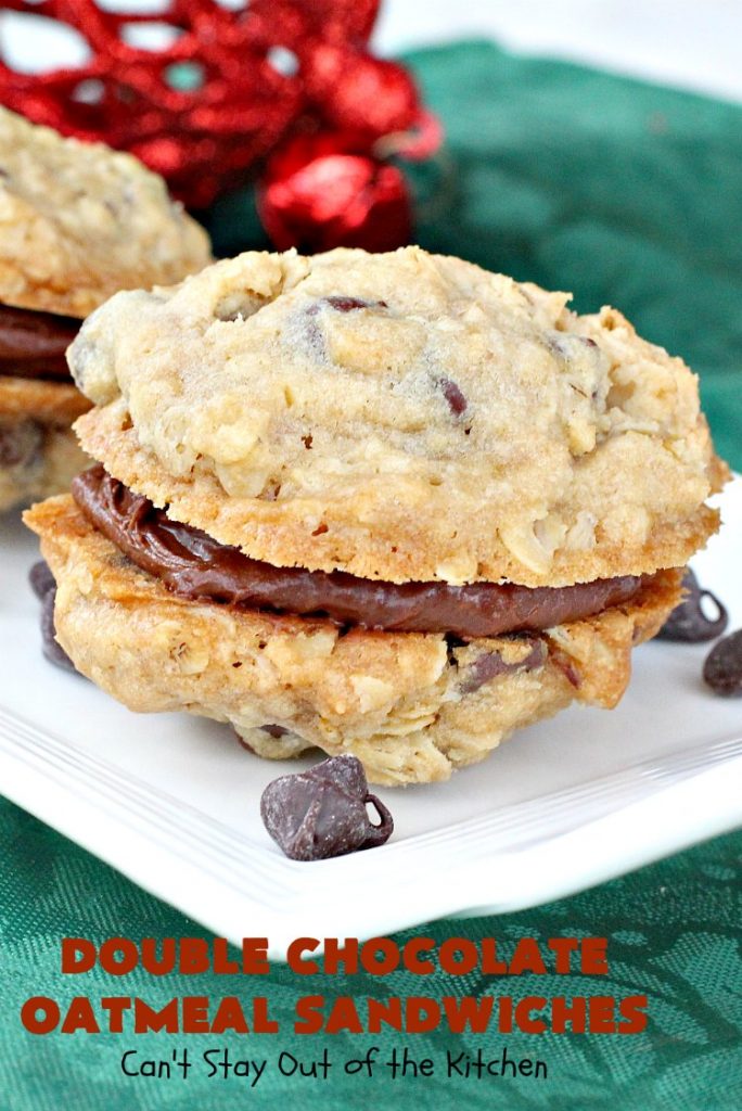 Double Chocolate Oatmeal Cookies | Can't Stay Out of the Kitchen | these spectacular #OatmealCookies feature #ChocolateChips in the #cookies and a #chocolate #fudge frosting sandwiched between to die for! Amazing #dessert for #holiday #ChristmasCookie baking. #ChristmasCookieExchange #FallBaking #DoubleChocolateOatmealSandwiches #ChocolateFudgeFrosting #HolidayDessert