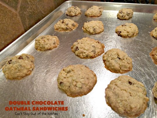 Double Chocolate Oatmeal Cookies | Can't Stay Out of the Kitchen | these spectacular #OatmealCookies feature #ChocolateChips in the #cookies and a #chocolate #fudge frosting sandwiched between to die for! Amazing #dessert for #holiday #ChristmasCookie baking. #ChristmasCookieExchange #FallBaking #DoubleChocolateOatmealSandwiches #ChocolateFudgeFrosting #HolidayDessert