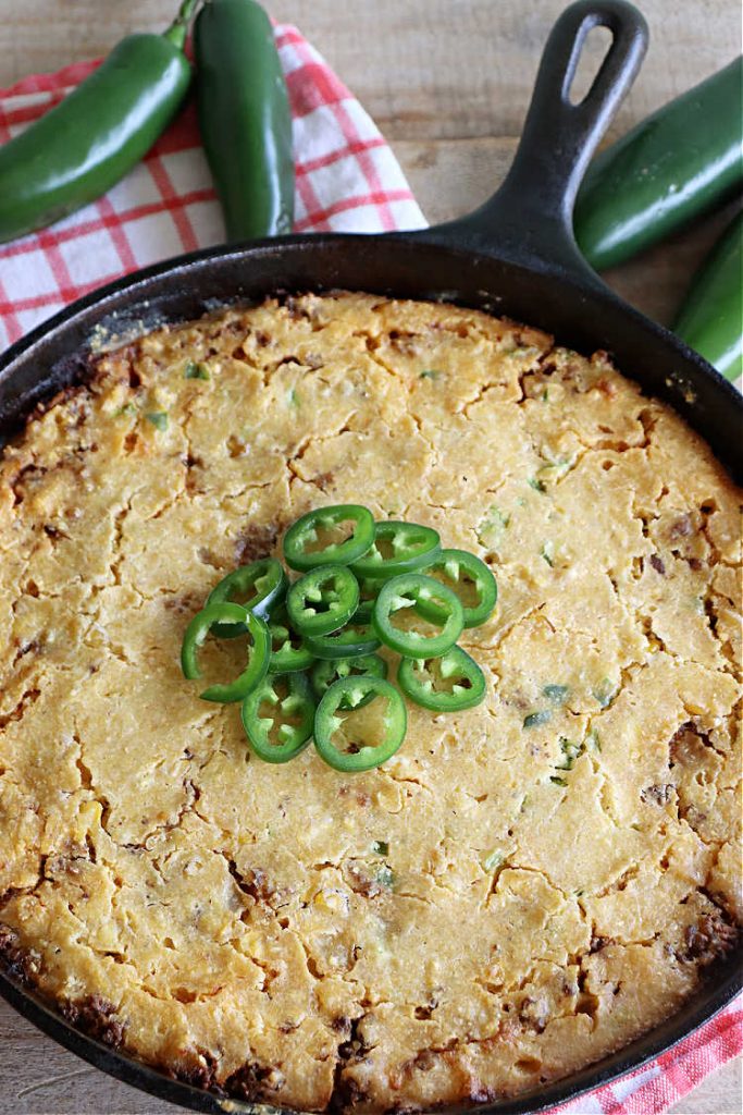 East Texas Mexican Cornbread | Can't Stay Out of the Kitchen | this fantastic layered #cornbread has a #GroundBeef layer in the middle that includes #CheddarCheese. The #cornbread layers include #CreamedCorn & #JalapeñoPeppers. Great for any #TexMex meal especially when served hot right out of the oven! #CincoDeMayo #Mexican #EastTexas #MexicanCornbread #EastTexasMexicanCornbread