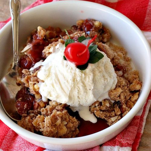 Easy Cherry Crisp| Can't Stay Out of the Kitchen | This scrumptious #dessert is also quick, easy & simple to make. Perfect for company or #ValentinesDay or other #holidays. #cherries #CherryDessert #EasyCherryCrisp