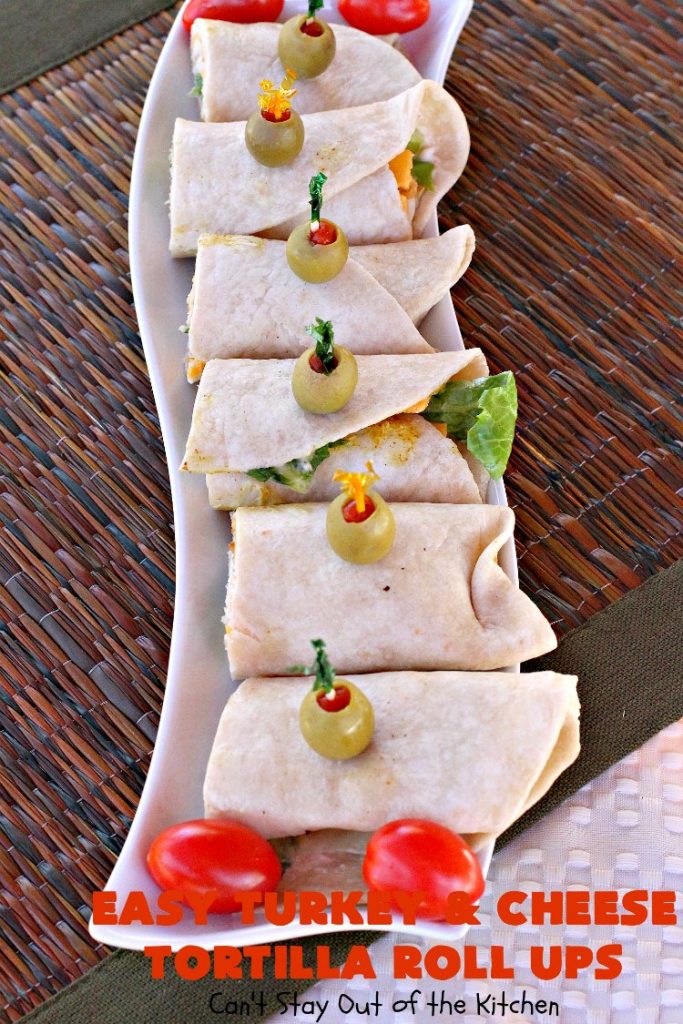 Easy Turkey and Cheese Tortilla Roll Ups | Can't Stay Out of the Kitchen | these fantastic wraps make a terrific treat for #tailgating parties, potlucks or soccer games. Easy & delicious. #sandwiches #cheese #TurkeySandwiches #TurkeyWraps #TurkeyRollUps #PepperJackCheese #SwissCheese #CheddarCheese