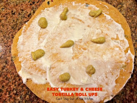 Easy Turkey and Cheese Tortilla Roll Ups | Can't Stay Out of the Kitchen | these fantastic wraps make a terrific treat for #tailgating parties, potlucks or soccer games. Easy & delicious. #sandwiches #cheese #TurkeySandwiches #TurkeyWraps #TurkeyRollUps #PepperJackCheese #SwissCheese #CheddarCheese