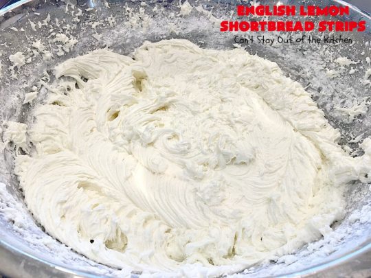 English Lemon Shortbread Strips | Can't Stay Out of the Kitchen | these amazing #lemon bars have a lemony icing to die for. They're terrific for #holiday parties, #Christmas #cookie exchanges or #tailgating. #dessert