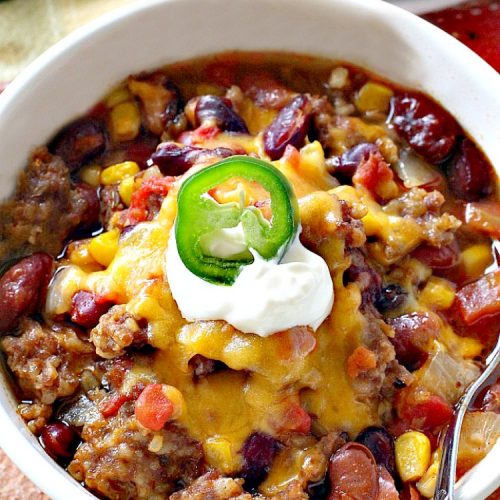 Firehouse Sausage Chili | This fantastic #chili uses #Italian #sausage, 2 kinds of #beans and a #chili seasoning packet to amp up the flavors. It's made in the #crockpot so it's incredibly easy.