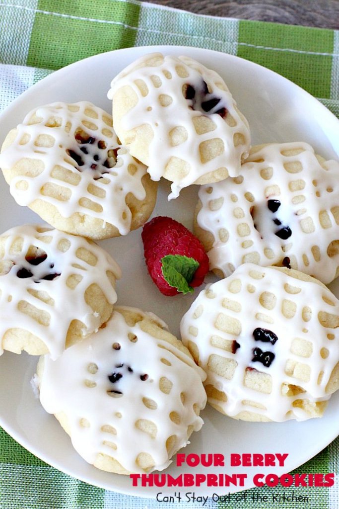 Four Berry Thumbprint Cookies | Can't Stay Out of the Kitchen | these fantastic #cookies are made with #raspberry, #cherry #blackberry & #strawberry jam. Perfect for any #holiday, potluck or family reunion. #dessert