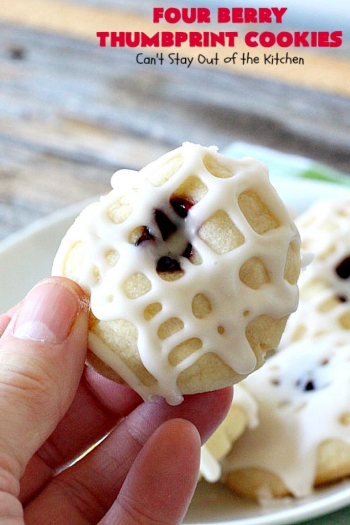 Four Berry Thumbprint Cookies | Can't Stay Out of the Kitchen | these fantastic #cookies are made with #raspberry, #cherry #blackberry & #strawberry jam. Perfect for any #holiday, potluck or family reunion. #dessert
