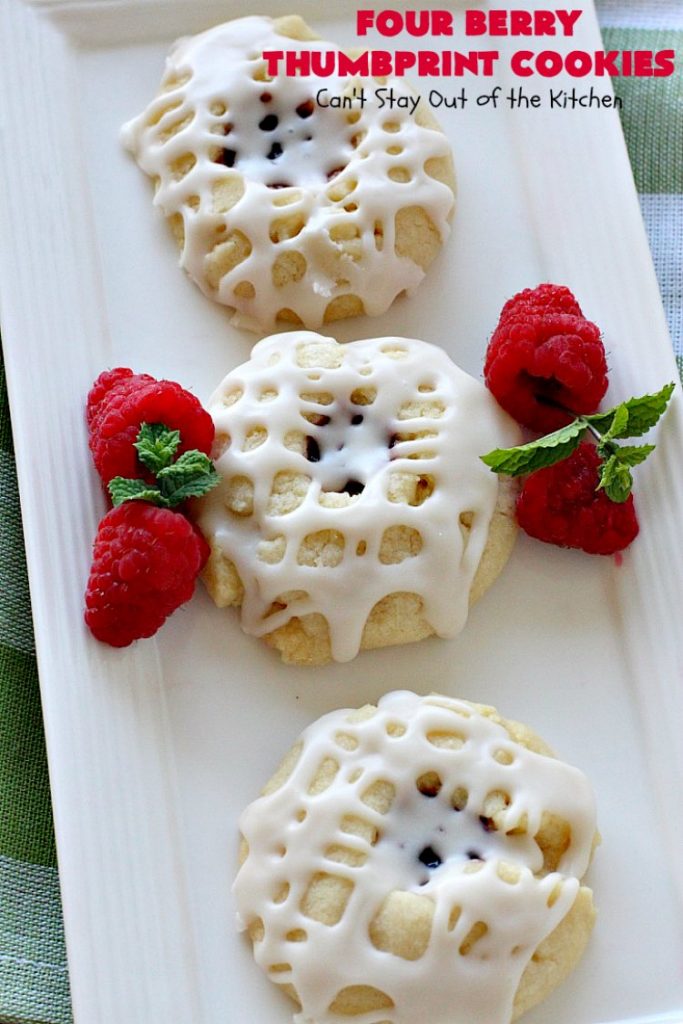 Four Berry Thumbprint Cookies | Can't Stay Out of the Kitchen | these fantastic #cookies are made with #raspberry, #cherry #blackberry & #strawberry jam. Perfect for any #holiday, potluck or family reunion. #dessert