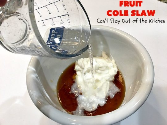 Fruit Cole Slaw | Can't Stay Out of the Kitchen | try this revved up version of #ColeSlaw for your next #holiday potluck. Perfect for #MothersDay, #MemorialDay, #FathersDay, #FourthofJuly & #LaborDay. This one includes #Strawberries #Blueberries, #Bananas & #FruitCocktail. #Salad #FruitColeSlaw #GlutenFree #Healthy #LowCalorie #CleanEating