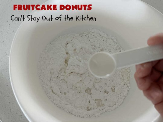 Fruitcake Donuts | Can't Stay Out of the Kitchen | #FruitcakeDonuts are divine! These heavenly #donuts are filled with #fruitcake mix & laced with #AlmondExtract which greatly increases the flavor. #Almond icing & #RainbowSprinkles amp up the flavors even more! Perfect for #Thanksgiving or #Christmas #breakfast or #brunch. #CandiedCherries #CandiedPineapple #ParadiseFruit #HolidayBreakfast #holiday