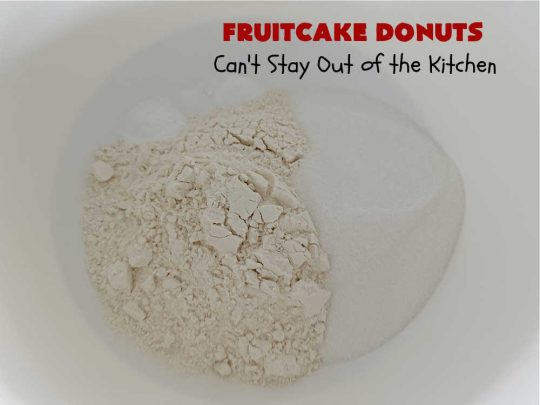 Fruitcake Donuts | Can't Stay Out of the Kitchen | #FruitcakeDonuts are divine! These heavenly #donuts are filled with #fruitcake mix & laced with #AlmondExtract which greatly increases the flavor. #Almond icing & #RainbowSprinkles amp up the flavors even more! Perfect for #Thanksgiving or #Christmas #breakfast or #brunch. #CandiedCherries #CandiedPineapple #ParadiseFruit #HolidayBreakfast #holiday