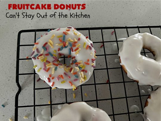 Fruitcake Donuts | Can't Stay Out of the Kitchen | #FruitcakeDonuts are divine! These heavenly #donuts are filled with #fruitcake mix & laced with #AlmondExtract which greatly increases the flavor.  #Almond icing & #RainbowSprinkles  amp up the flavors even more! Perfect for #Thanksgiving or #Christmas #breakfast or #brunch. #CandiedCherries #CandiedPineapple #ParadiseFruit #HolidayBreakfast #holiday