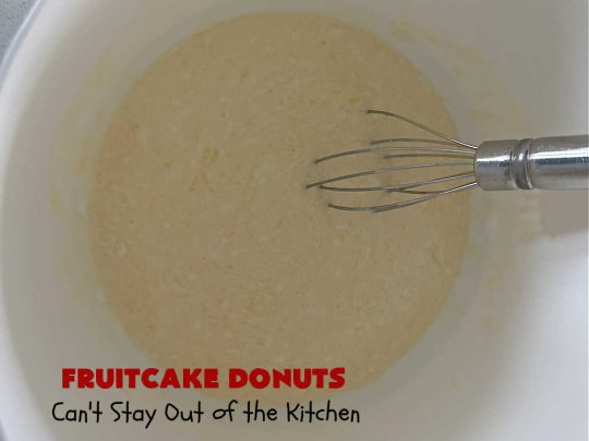Fruitcake Donuts | Can't Stay Out of the Kitchen | #FruitcakeDonuts are divine! These heavenly #donuts are filled with #fruitcake mix & laced with #AlmondExtract which greatly increases the flavor. #Almond icing & #RainbowSprinkles amp up the flavors even more! Perfect for #Thanksgiving or #Christmas #breakfast or #brunch. #CandiedCherries #CandiedPineapple #ParadiseFruit #HolidayBreakfast #holiday