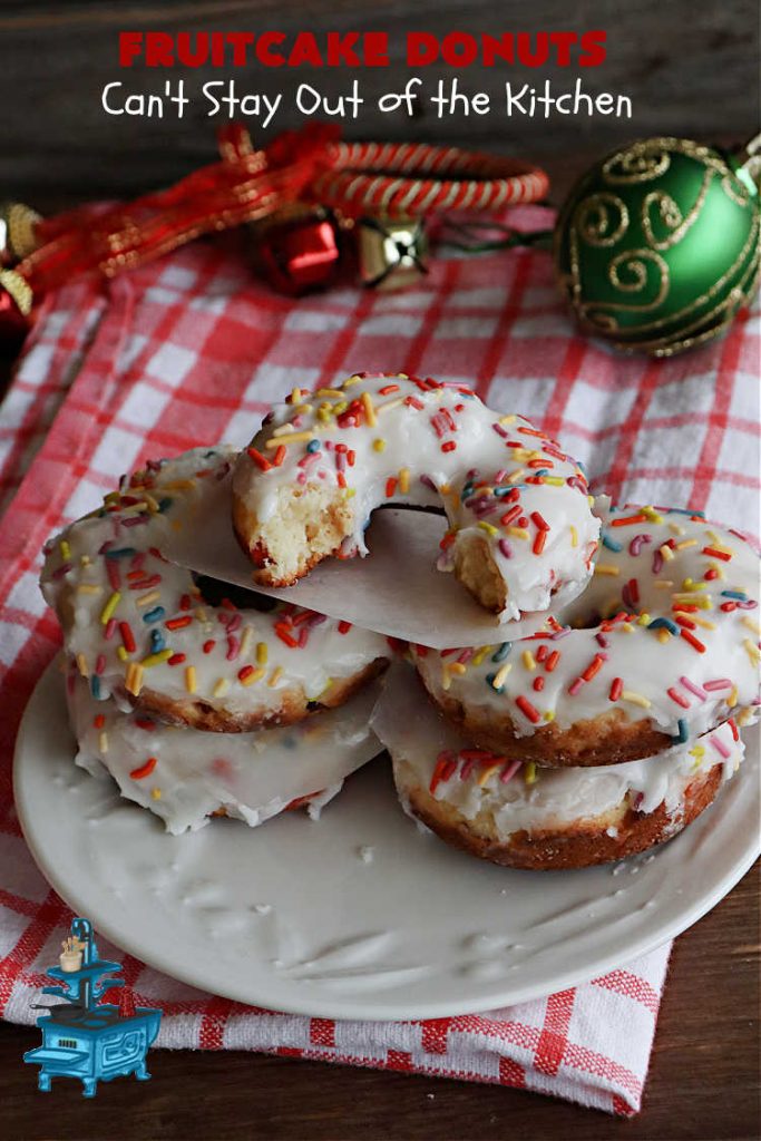 Fruitcake Donuts | Can't Stay Out of the Kitchen | #FruitcakeDonuts are divine! These heavenly #donuts are filled with #fruitcake mix & laced with #AlmondExtract which greatly increases the flavor. #Almond icing & #RainbowSprinkles amp up the flavors even more! Perfect for #Thanksgiving or #Christmas #breakfast or #brunch. #CandiedCherries #CandiedPineapple #ParadiseFruit #HolidayBreakfast #holiday