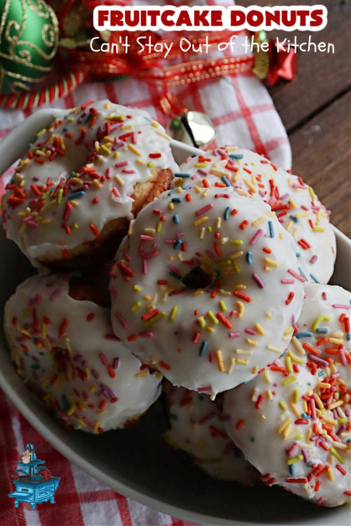 Fruitcake Donuts | Can't Stay Out of the Kitchen | #FruitcakeDonuts are divine! These heavenly #donuts are filled with #fruitcake mix & laced with #AlmondExtract which greatly increases the flavor. #Almond icing & #RainbowSprinkles amp up the flavors even more! Perfect for #Thanksgiving or #Christmas #breakfast or #brunch. #CandiedCherries #CandiedPineapple #ParadiseFruit #HolidayBreakfast #holiday