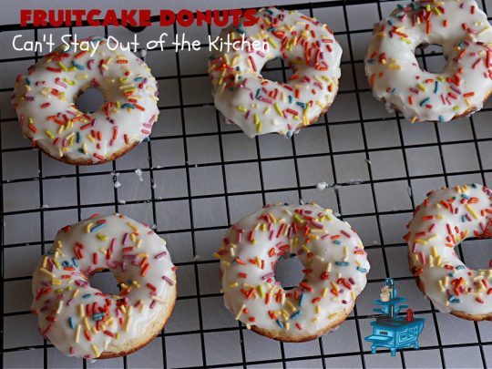 Fruitcake Donuts | Can't Stay Out of the Kitchen | #FruitcakeDonuts are divine! These heavenly #donuts are filled with #fruitcake mix & laced with #AlmondExtract which greatly increases the flavor. #Almond icing & #RainbowSprinkles amp up the flavors even more! Perfect for #Thanksgiving or #Christmas #breakfast or #brunch. #CandiedCherries #CandiedPineapple #ParadiseFruit #HolidayBreakfast #holiday