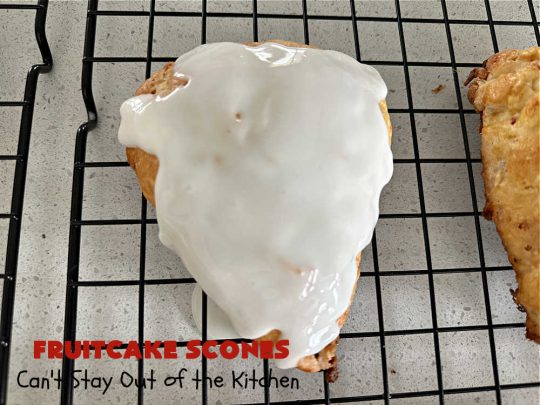 Fruitcake Scones | Can't Stay Out of the Kitchen | these #FruitcakeScones are to die for! Truly, these #scones are filled with #FruitcakeMix & laced with #AlmondExtract in the scone and the icing. Perfect for #breakfast or #brunch menus during #Thanksgiving week or #Christmas week. You'll be drooling over every bite! #holiday #HolidayBreakfast #HolidayBaking #fruitcake #cherries #ParadiseFruit