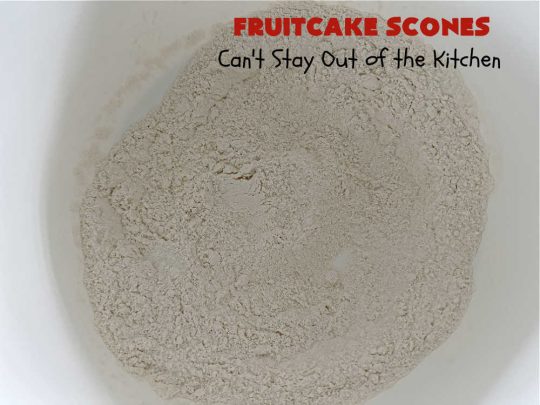 Fruitcake Scones | Can't Stay Out of the Kitchen | these #FruitcakeScones are to die for! Truly, these #scones are filled with #FruitcakeMix & laced with #AlmondExtract in the scone and the icing. Perfect for #breakfast or #brunch menus during #Thanksgiving week or #Christmas week. You'll be drooling over every bite! #holiday #HolidayBreakfast #HolidayBaking #fruitcake #cherries #ParadiseFruit