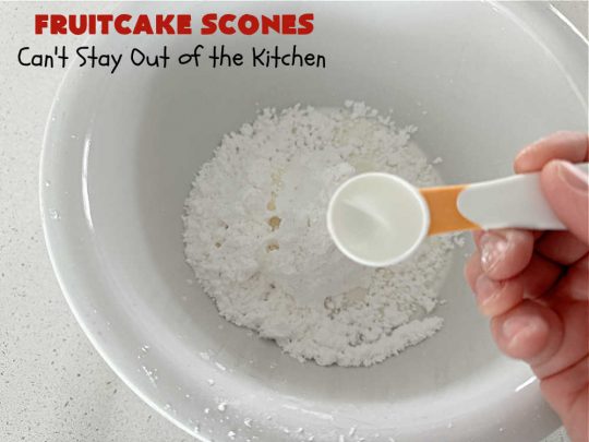 Fruitcake Scones | Can't Stay Out of the Kitchen | these #FruitcakeScones are to die for! Truly, these #scones are filled with #FruitcakeMix & laced with #AlmondExtract in the scone and the icing. Perfect for #breakfast or #brunch menus during #Thanksgiving week or #Christmas week. You'll be drooling over every bite! #holiday #HolidayBreakfast #HolidayBaking #fruitcake #cherries #ParadiseFruit