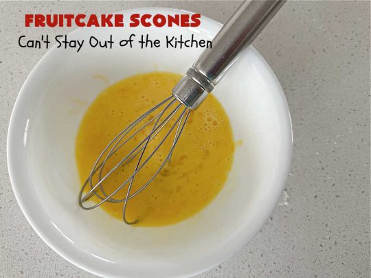 Fruitcake Scones | Can't Stay Out of the Kitchen | these #FruitcakeScones are to die for! Truly, these #scones are filled with #FruitcakeMix & laced with #AlmondExtract in the scone and the icing. Perfect for #breakfast or #brunch menus during #Thanksgiving week or #Christmas week. You'll be drooling over every bite! #holiday #HolidayBreakfast #HolidayBaking #fruitcake #cherries #ParadiseFruit