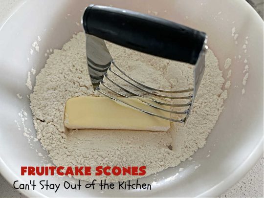 Fruitcake Scones | Can't Stay Out of the Kitchen | these #FruitcakeScones are to die for! Truly, these #scones are filled with #FruitcakeMix & laced with #AlmondExtract in the scone and the icing. Perfect for #breakfast or #brunch menus during #Thanksgiving week or #Christmas week. You'll be drooling over every bite! #holiday #HolidayBreakfast #HolidayBaking #fruitcake #cherries #ParadiseFruit