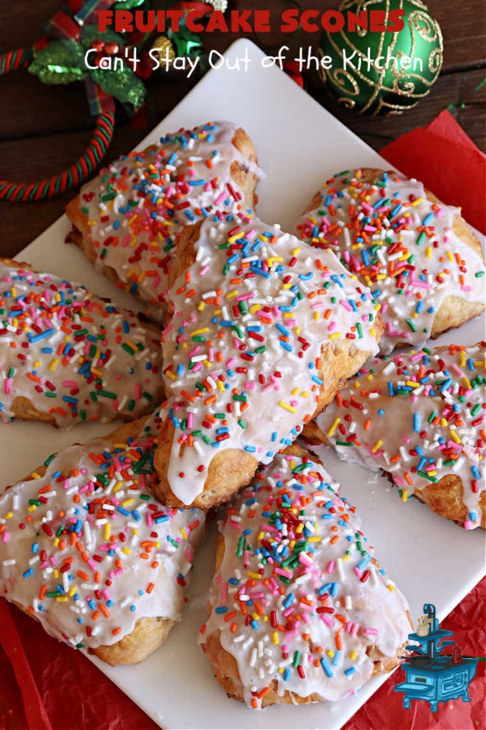 Fruitcake Scones | Can't Stay Out of the Kitchen | these #FruitcakeScones are to die for! Truly, these #scones are filled with #FruitcakeMix & laced with #AlmondExtract in the scone and the icing. Perfect for #breakfast or #brunch menus during #Thanksgiving week or #Christmas week. You'll be drooling over every bite! #holiday #HolidayBreakfast #HolidayBaking #fruitcake #cherries #ParadiseFruit