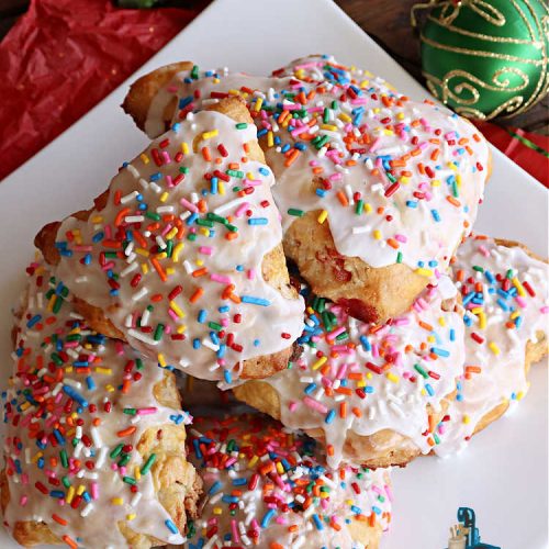 Fruitcake Scones | Can't Stay Out of the Kitchen | these #FruitcakeScones are to die for! Truly, these #scones are filled with #FruitcakeMix & laced with #AlmondExtract in the scone and the icing. Perfect for #breakfast or #brunch menus during #Thanksgiving week or #Christmas week. You'll be drooling over every bite! #holiday #HolidayBreakfast #HolidayBaking #fruitcake #cherries #ParadiseFruit