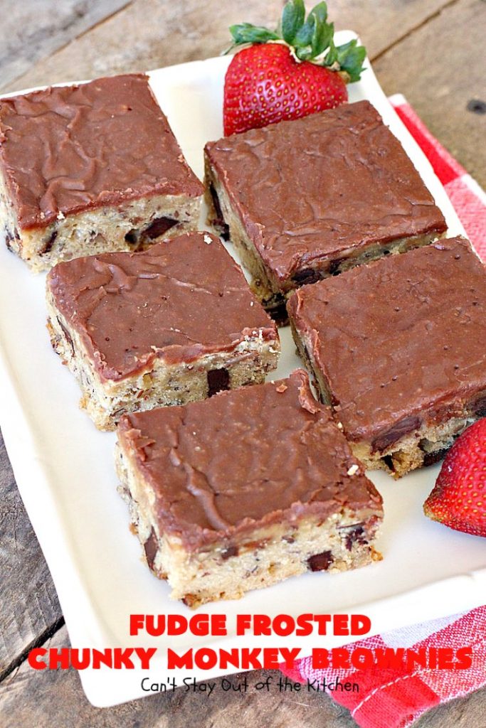 Fudge Frosted Chunky Monkey Brownies | Can't Stay Out of the Kitchen | These heavenly #brownies have #chocolate chunks in the batter & #fudge frosting on top. This addictive #dessert has triple the chocolate threat when you add ice cream & #Ghirardelli chocolate sauce on top!