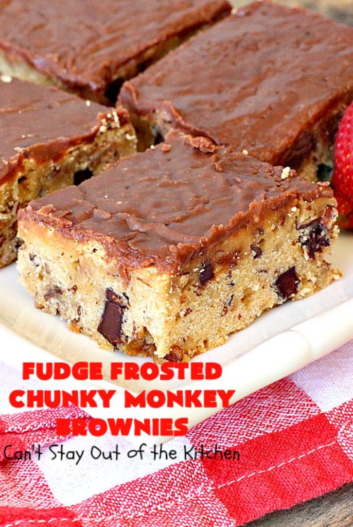 Fudge Frosted Chunky Monkey Brownies | Can't Stay Out of the Kitchen | These heavenly #brownies have #chocolate chunks in the batter & #fudge frosting on top. This addictive #dessert has triple the chocolate threat when you add ice cream & #Ghirardelli chocolate sauce on top!
