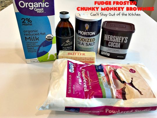 Fudge Frosted Chunky Monkey Brownies | Can't Stay Out of the Kitchen | These heavenly #brownies have #chocolate chunks in the batter & #fudge frosting on top. This addictive #dessert has triple the chocolate threat when you add ice cream & #Ghirardelli chocolate sauce on top!